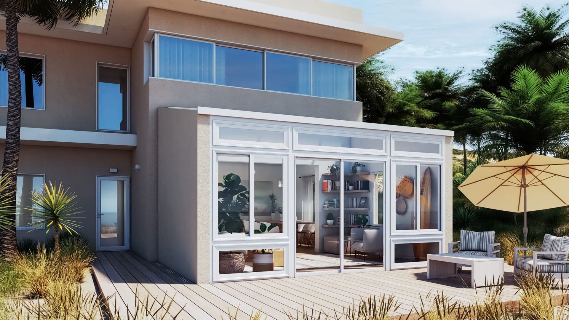Modern house exterior with large windows, a sunroom, and patio furniture. Surrounded by lush greenery and palm trees under a clear blue sky.